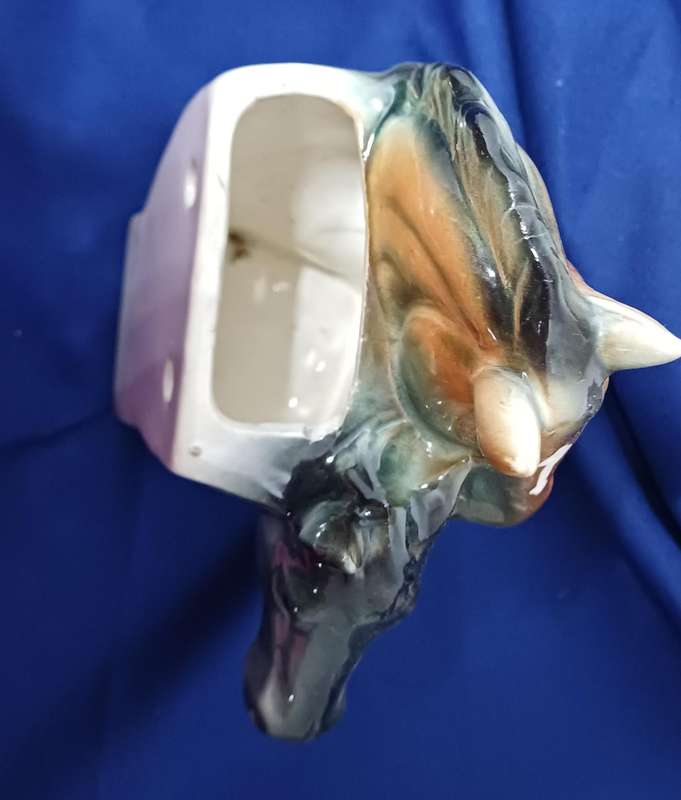 Two horse vase wall hangings