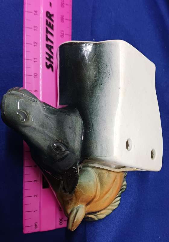 Two horse vase wall hangings