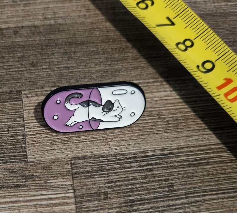 Cat in a Pill Enamel Pin