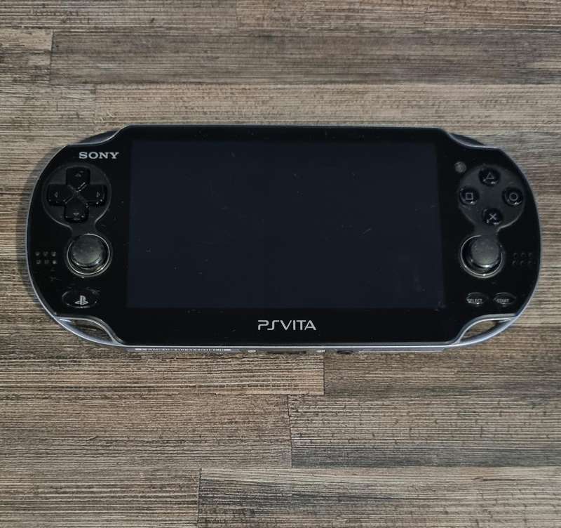 PS Vita Console + Game + Charger