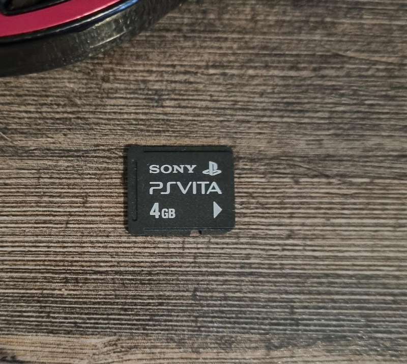 PS Vita Console + Game + Charger