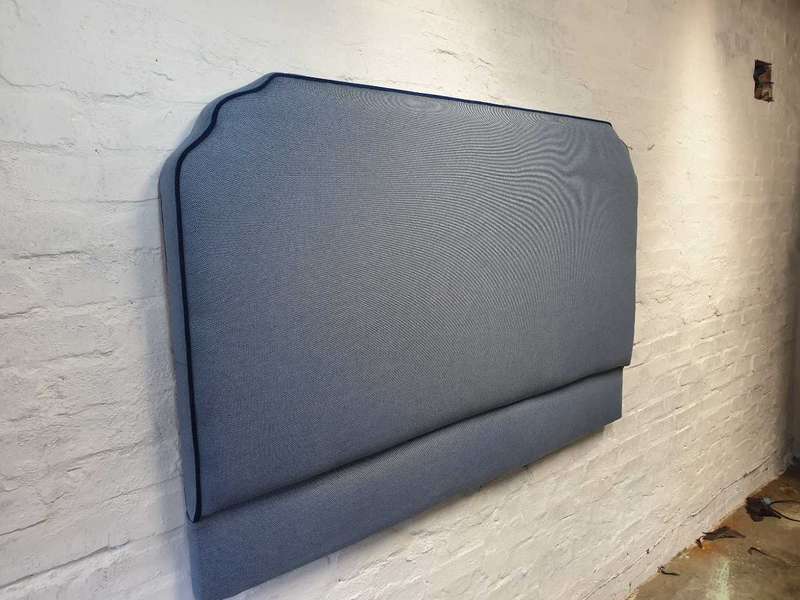 Light blue headboard with navy piping