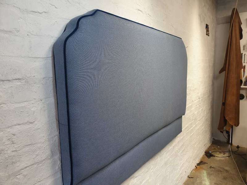 Light blue headboard with navy piping