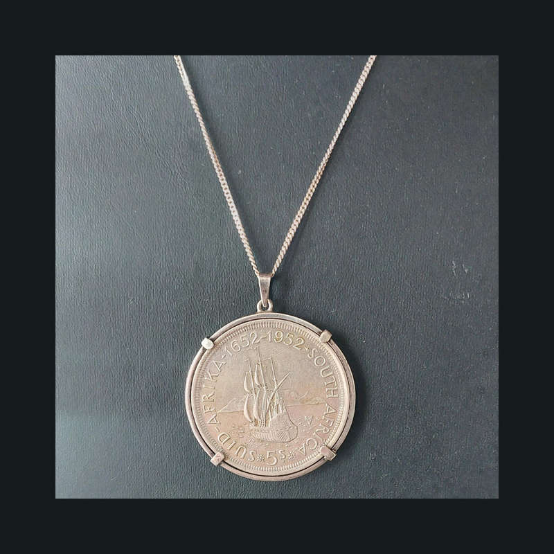 George VI Five Shilling Coin set in silver pendant frame