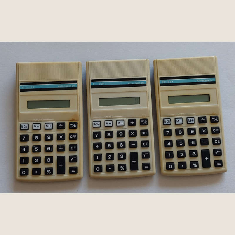 Three old Sharp EL-231 Calculators