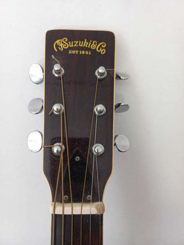 Suzuki steel string guitar