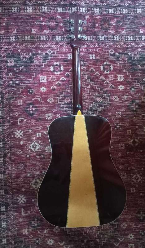 Suzuki steel string guitar