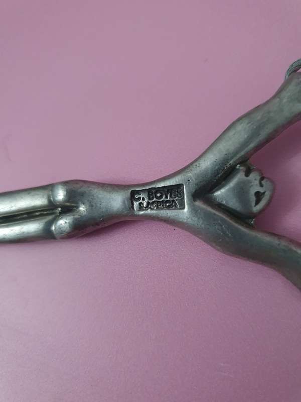 Unique Carrol Boyes Picture Frame Hanger Set