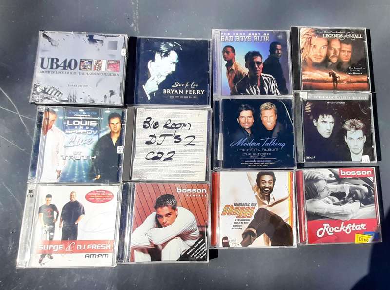 Variety of 12 music cd's listed in description