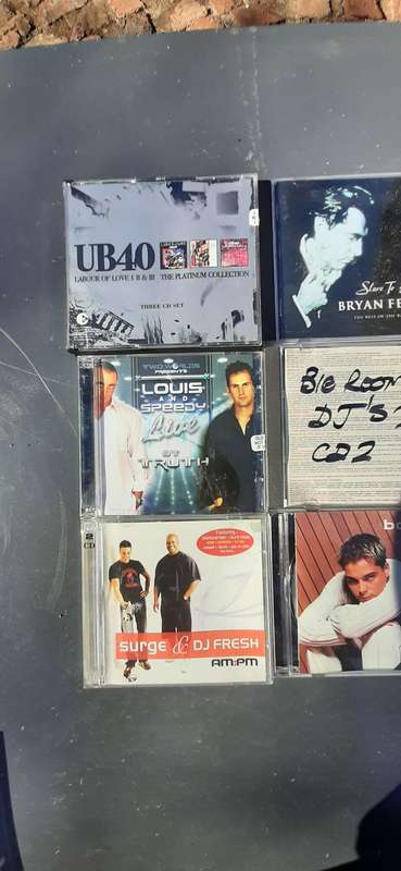 Variety of 12 music cd's listed in description