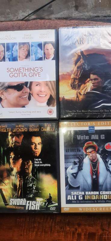 Selection of 24  dvd's movies of all sorts. Look at pics.