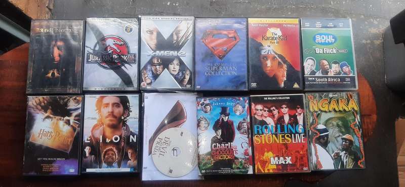 Selection of 24  dvd's movies of all sorts. Look at pics.