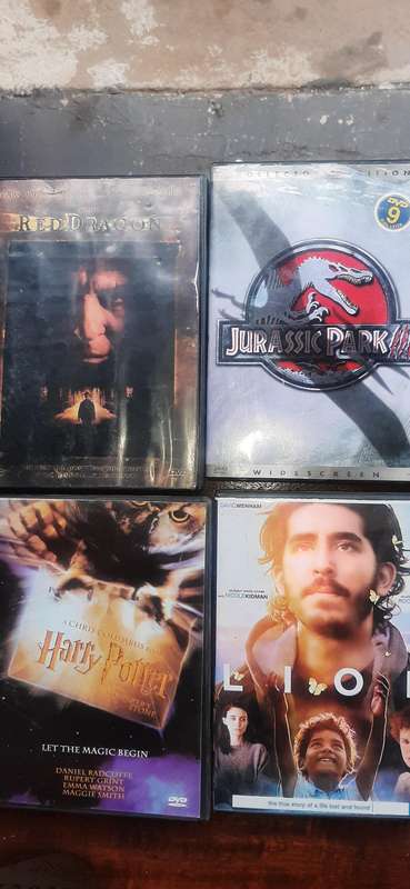 Selection of 24  dvd's movies of all sorts. Look at pics.