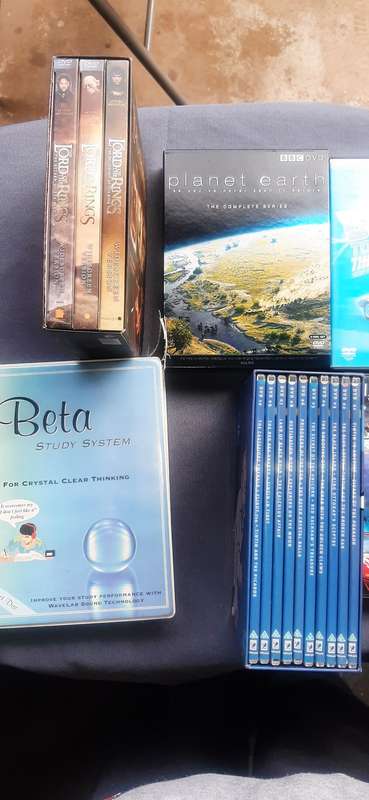 Collection of 8 movie dvd's sets and collectibles.Dispription on pictures