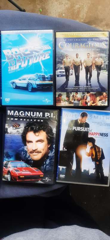 Collection of 8 movie dvd's sets and collectibles.Dispription on pictures