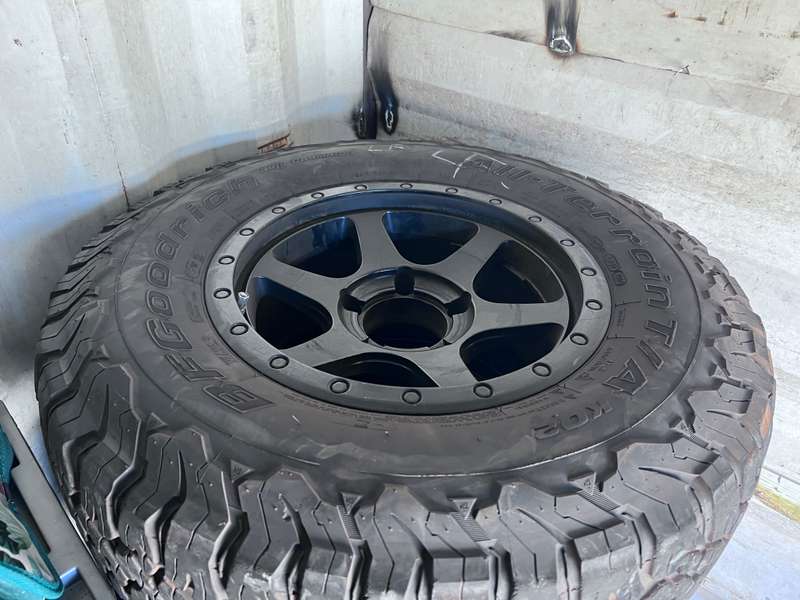 285/70/17 BF Goodrich KO2 All Terrain Tyres & with black Mag Rims will fit Land Cruiser 200