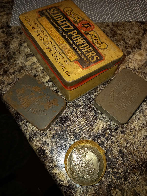 Antique tins and pins