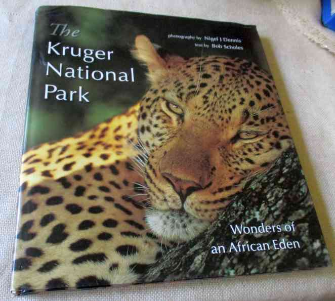 THE KRUGER PARK - WONDERS OF AN AFRICAN EDEN - NIGEL J DENNIS & BOB SCHOLES ( book has a minor bump