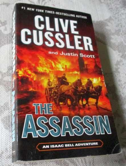 THE ASSASSIN - CLIVE CUSSLER AND JUSTIN SCOTT - AN ISAAC BELL ADVENTURE