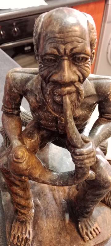 Vintage Art Sculpture Black Soapstone Heavy Carved Figurine Man Smoking Pipe
