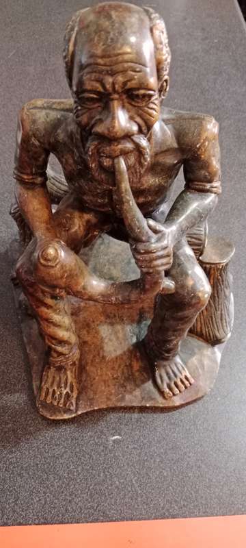 Vintage Art Sculpture Black Soapstone Heavy Carved Figurine Man Smoking Pipe