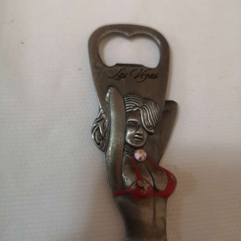 Rare 1980s Las Vegas 9 bottle opener. Beautiful Women cut out.