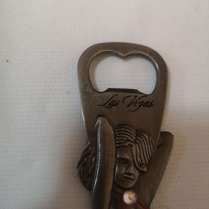 Rare 1980s Las Vegas 9 bottle opener. Beautiful Women cut out.