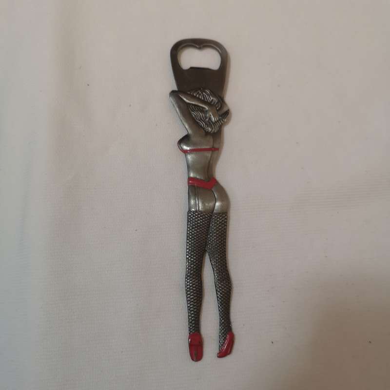 Rare 1980s Las Vegas 9 bottle opener. Beautiful Women cut out.