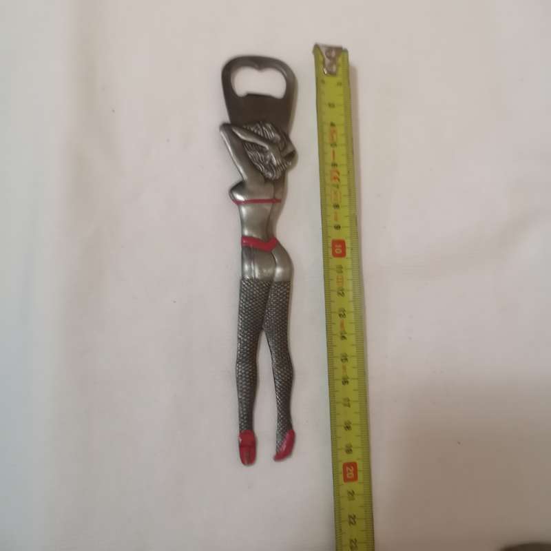 Rare 1980s Las Vegas 9 bottle opener. Beautiful Women cut out.