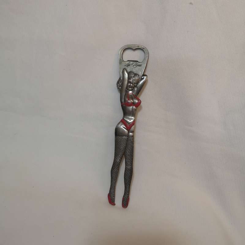 Rare 1980s Las Vegas 9 bottle opener. Beautiful Women cut out.