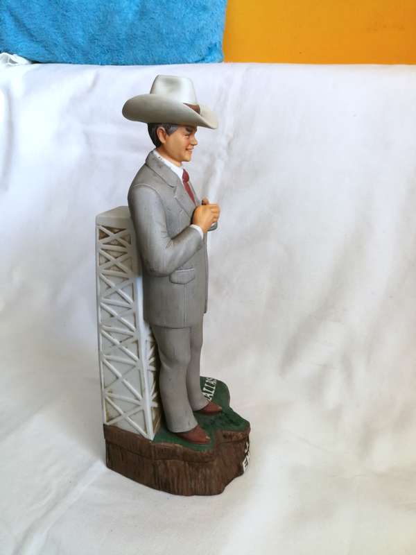 80s Americana Porcelain J.R. Ewing music box/liquor decanter