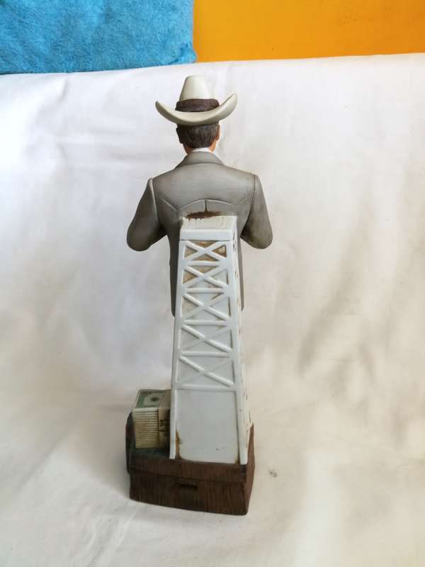 80s Americana Porcelain J.R. Ewing music box/liquor decanter