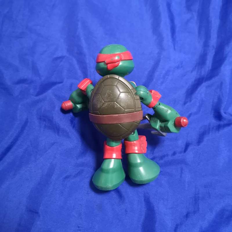 Teenage Mutant Ninja Turtle Action Figure Raphael Moving Arms - VIACOM Intl