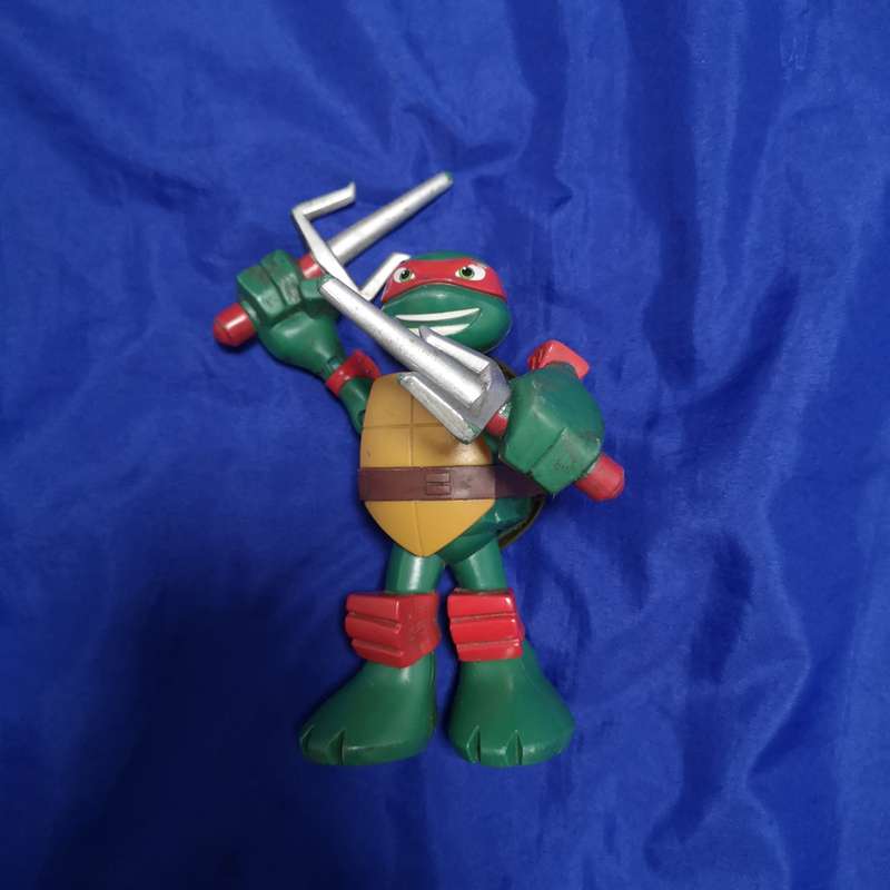 Teenage Mutant Ninja Turtle Action Figure Raphael Moving Arms - VIACOM Intl