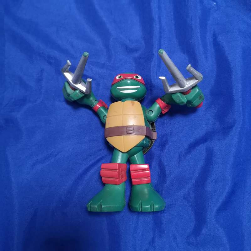 Teenage Mutant Ninja Turtle Action Figure Raphael Moving Arms - VIACOM Intl