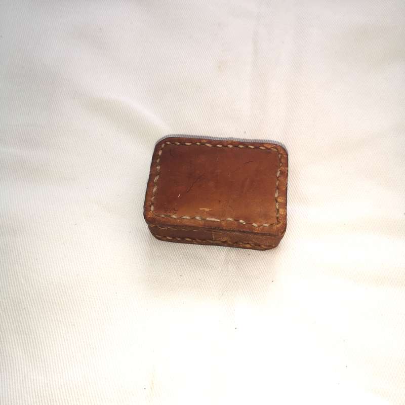 Iron block encased in thick leather- Vintage