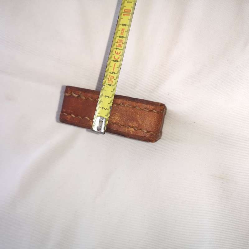 Iron block encased in thick leather- Vintage