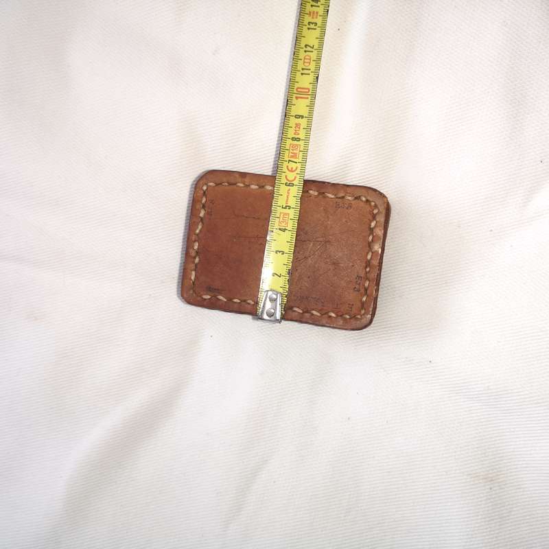 Iron block encased in thick leather- Vintage