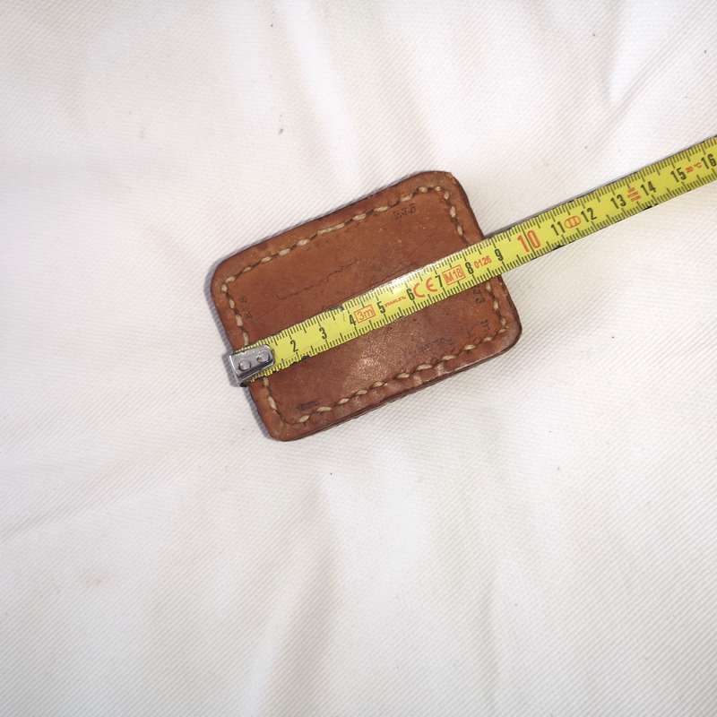 Iron block encased in thick leather- Vintage