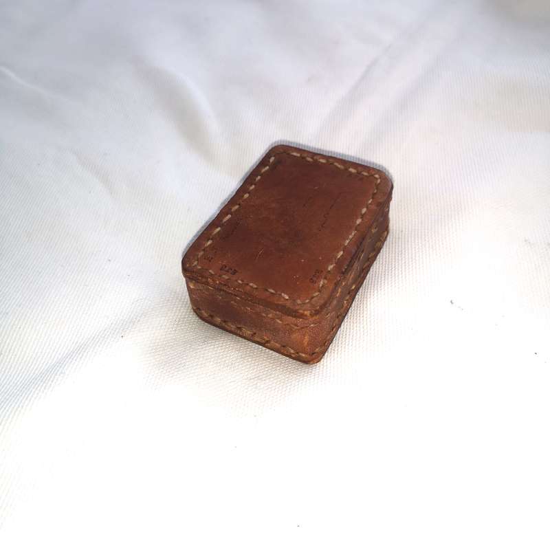 Iron block encased in thick leather- Vintage