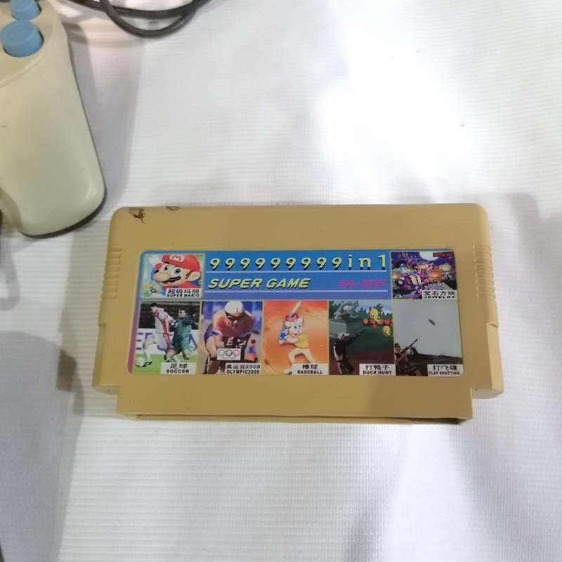 "TV GAME SG-662" console. Retro-style video game console with Cartridge- Mario Brothers & Others