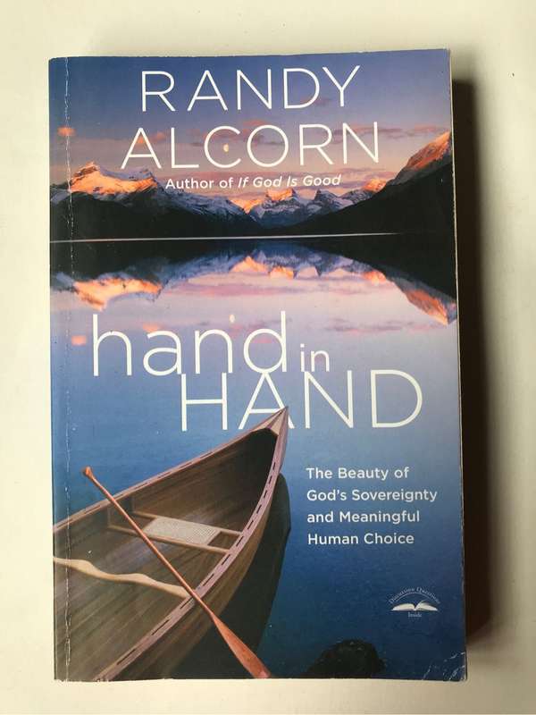 Hand in Hand: The Beauty of God's Sovereignty and Meaningful Human Choice by Randy Alcorn