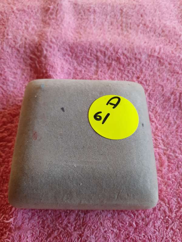 Empty Grey Coin Holder Box.