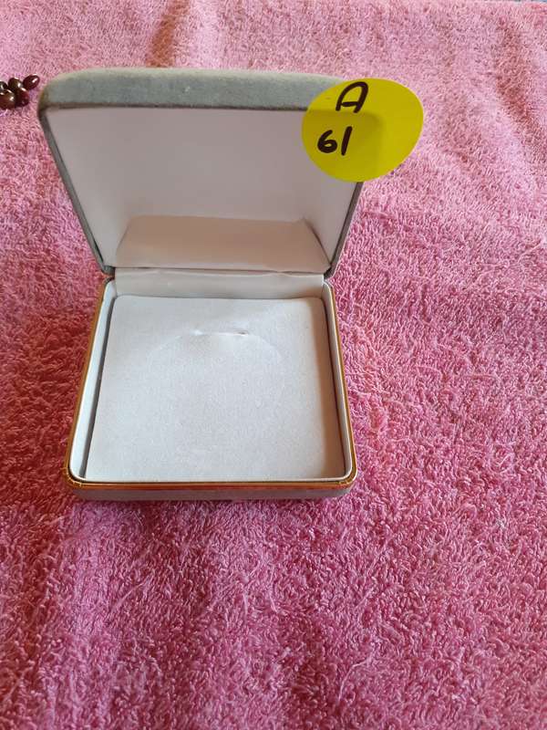 Empty Grey Coin Holder Box.