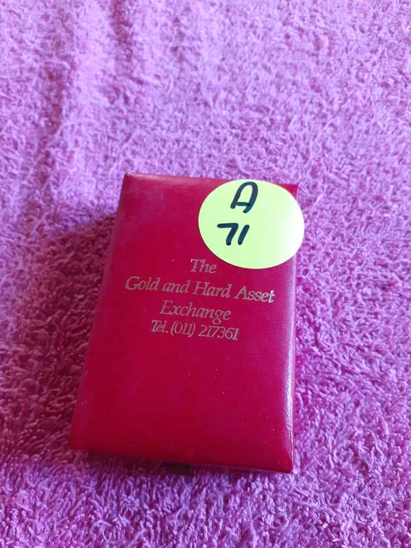 Empty Red Coin Holder Box. The Gold and Hand Asset Exchange