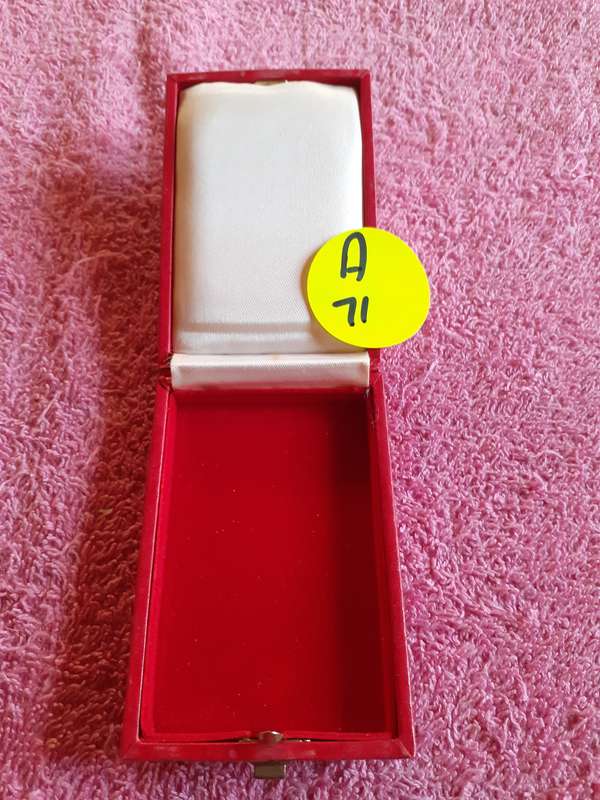 Empty Red Coin Holder Box. The Gold and Hand Asset Exchange