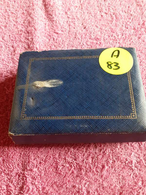 Empty Blue Coin Holder Box.