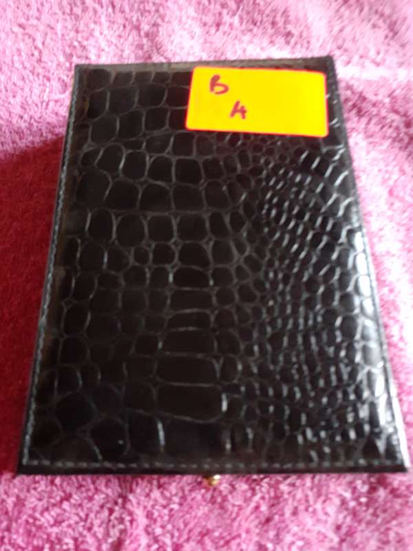 Empty Black Coin Holder Box.