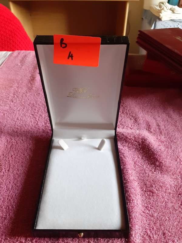 Empty Black Coin Holder Box.
