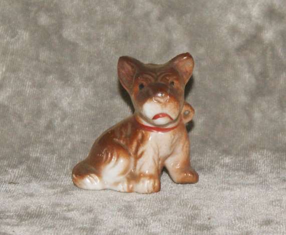 Vintage porcelain dog figurine